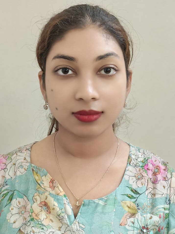 A person with red lipstick and a floral shirt  AI-generated content may be incorrect.